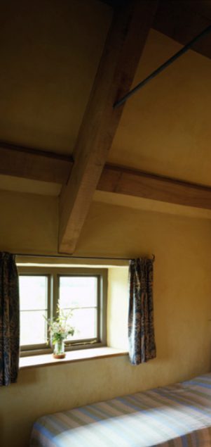 Simple timber framing exposed in bedrooms